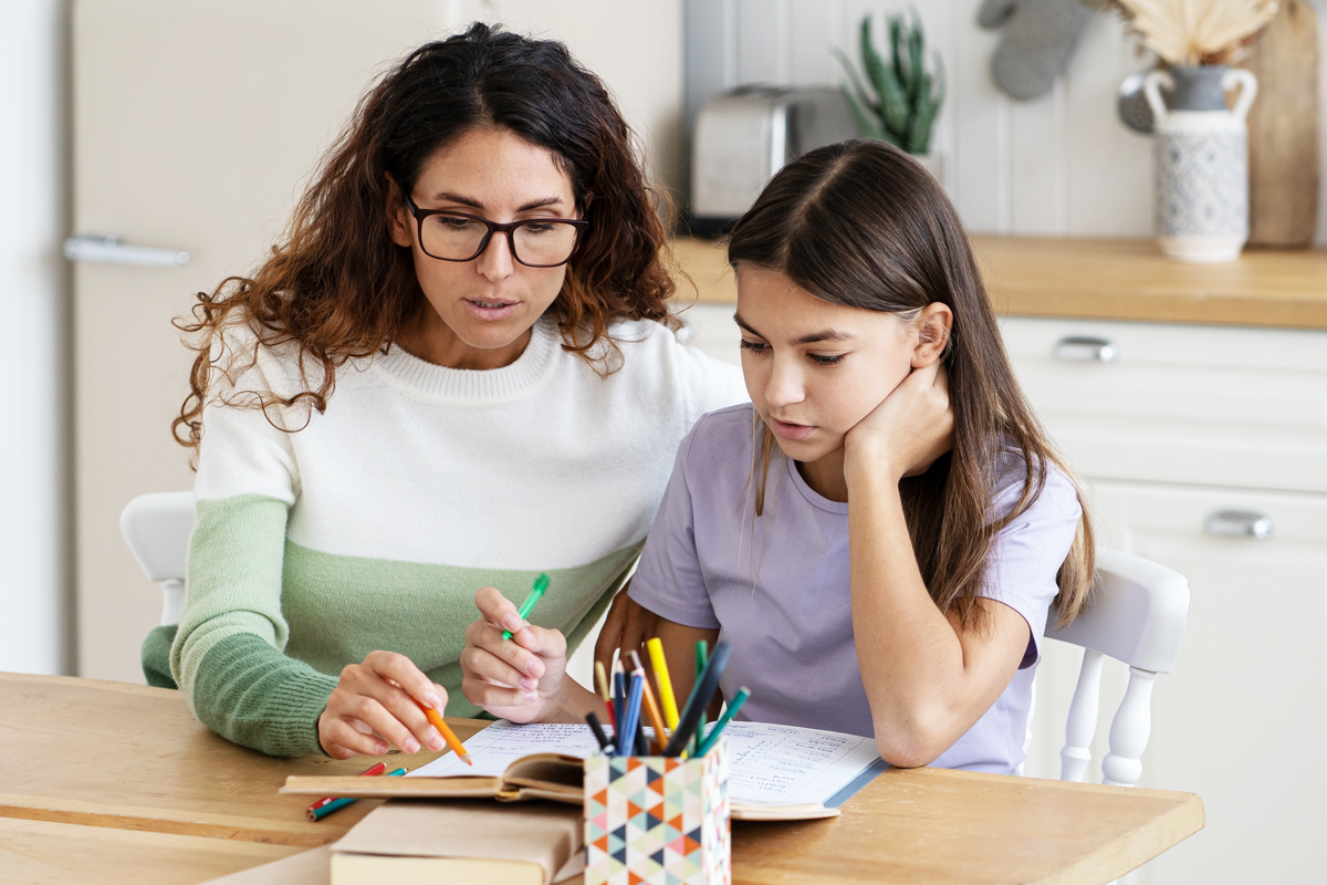 Mother and daughter working on homework